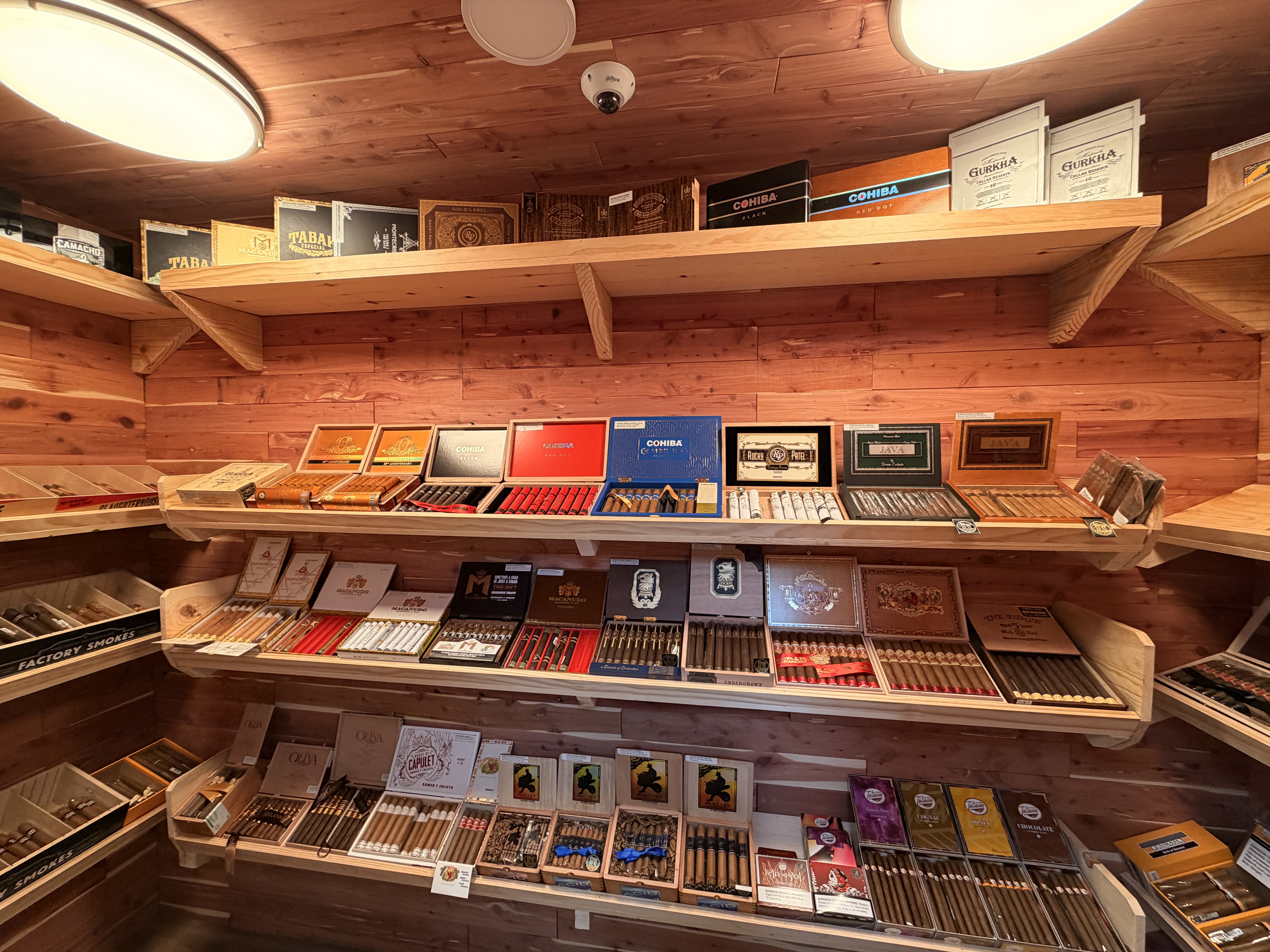 Cedar-lined cigar humidor with premium cigar collection